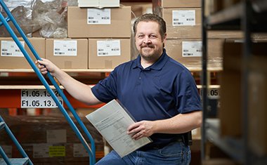 employee on warehouse stairs